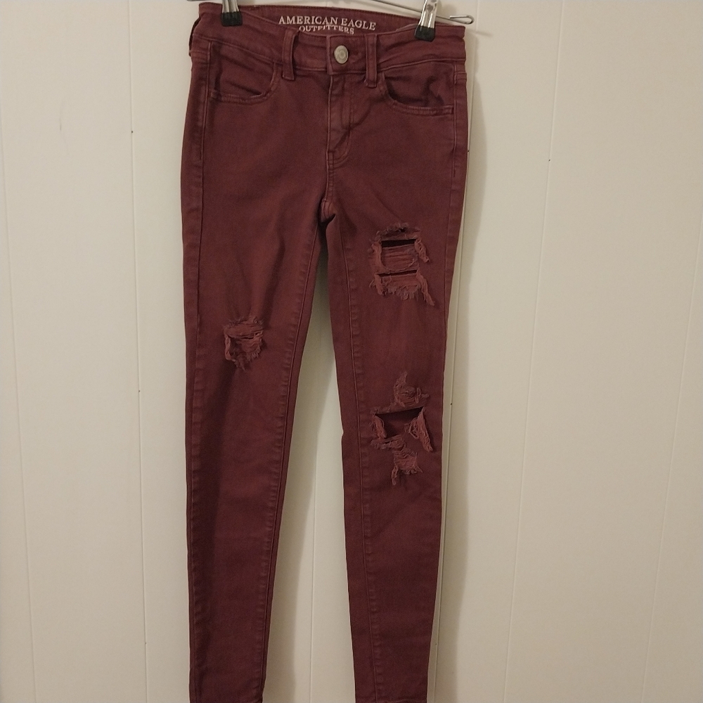 American Eagle Outfitters Burgundy Jeggings with Slim Fit and Distressing